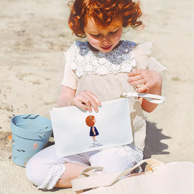 Vegan Leather Clutches Personalized With A Custom Portrait Of Your Kid